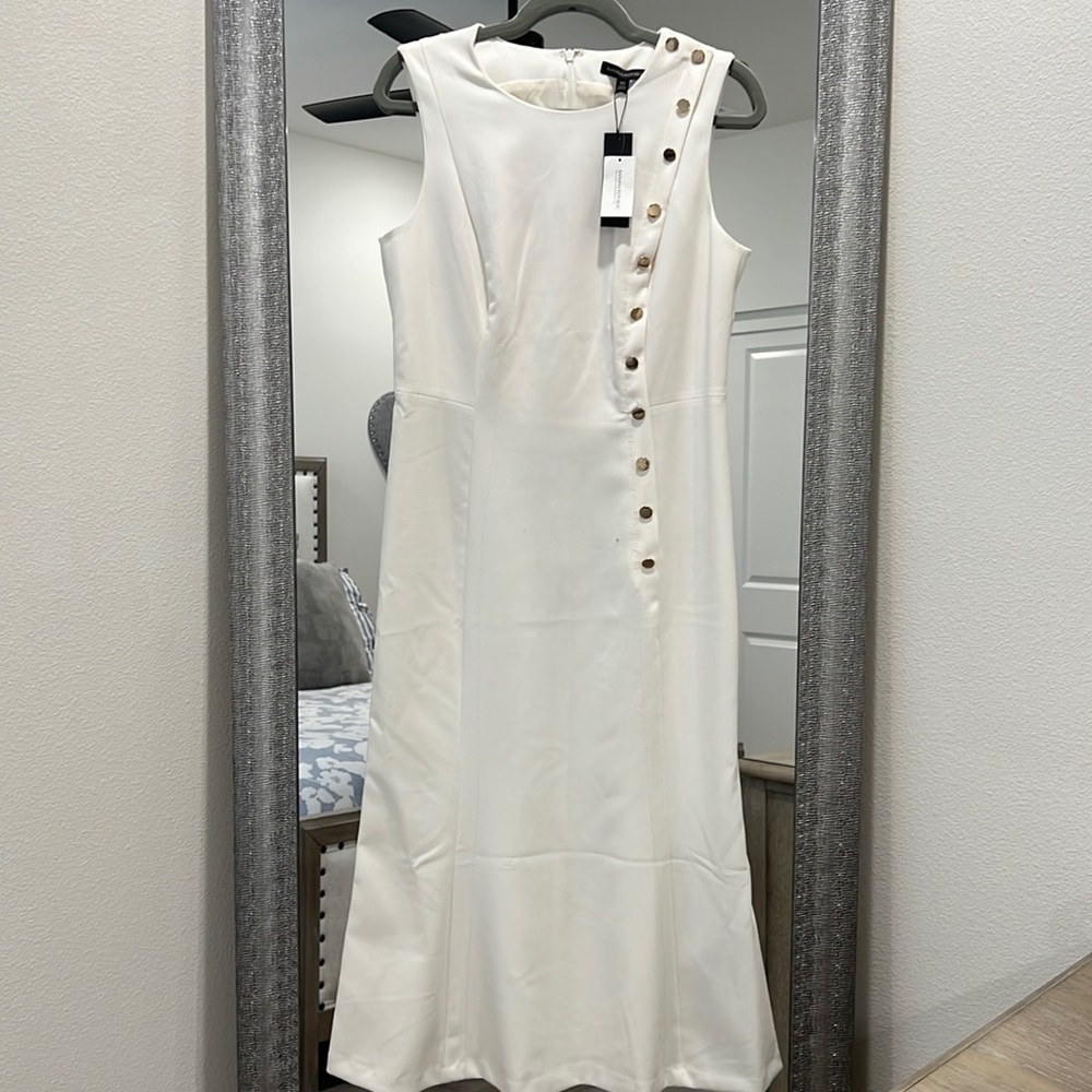 Beautiful Ivory sleeveless dress with gold buttons